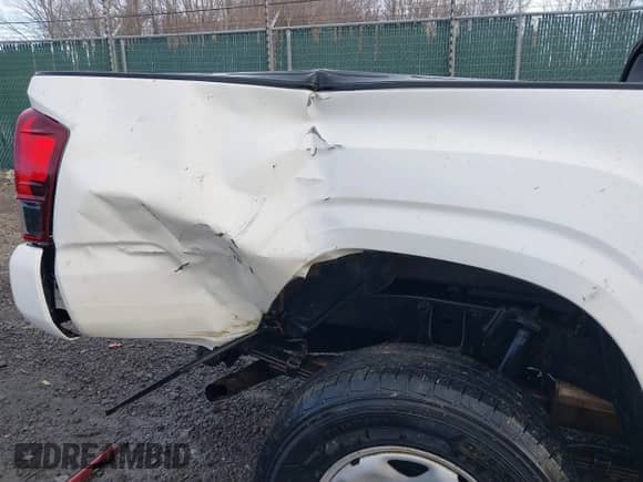 2019 Toyota Tacoma SR with VIN 3TMCZ5ANXKM257869, listed as a IAAI auction lot 41715668 with 99,452 mi miles and . Bid and sale history available at DreamBid. Image 6.
