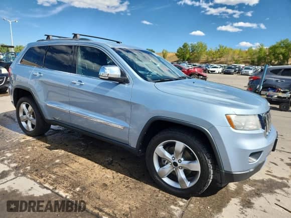 2013 Jeep Grand Cherokee Limited z VIN 1C4RJFBT9DC573370, wystawiony jako Copart lot #80716325 z przebiegiem 151 832 mil mil oraz Czysty tytuł • Clean title. Historia ofert i sprzedaży dostępna na DreamBid. Obrazek 4.