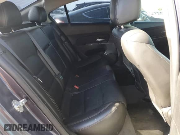 2013 Chevrolet Cruze 2LT с VIN 1G1PE5SB4D7121180, выставлен на аукционе Copart как лот 65310255 с пробегом 141 984 миль миль и Списание • Salvage title. История ставок и продаж доступна на DreamBid. Изображение 10.