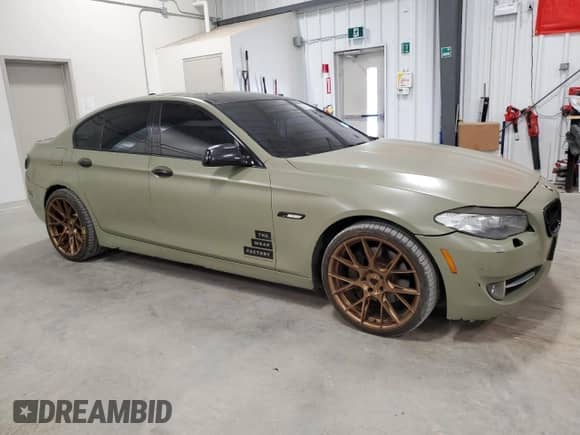 2011 BMW 5 Series 550i with VIN WBAFR9C55BC270884, listed as a Copart auction lot 65214165 with 238,207 mi miles and Clean title. Bid and sale history available at DreamBid. Image 4.