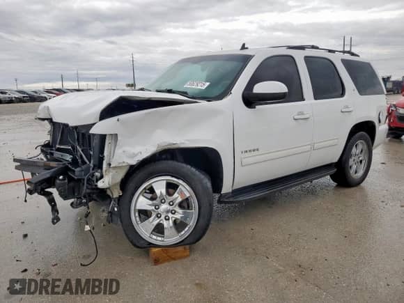 2012 Chevrolet Tahoe LT with VIN 1GNSCBE07CR135357, listed as a Copart auction lot 50629215 with 200,731 mi miles and Salvage title. Bid and sale history available at DreamBid. Image 1.
