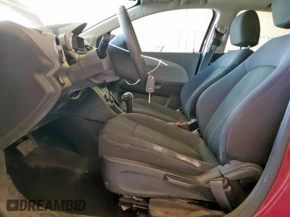 2014 Chevrolet Sonic LT with VIN 1G1JC6SHXE4132404, listed as a Copart auction lot 65522515 with 86,388 mi miles and Salvage title. Bid and sale history available at DreamBid. Image 7.