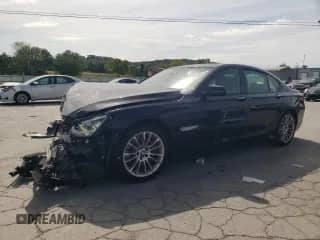 2015 BMW 7 Series 750i xDrive с VIN WBAYB6C5XFD966183, выставлен на аукционе Copart как лот 70422505 с пробегом 88 599 миль миль и Списание • Salvage title. История ставок и продаж доступна на DreamBid. Изображение 1.