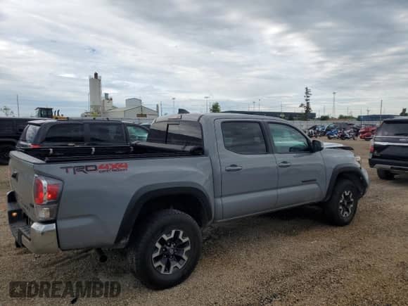 2021 Toyota Tacoma SR with VIN 3TMCZ5AN5MM418762, listed as a Copart auction lot 66169995 with 73,465 mi miles and Salvage title. Bid and sale history available at DreamBid. Image 3.