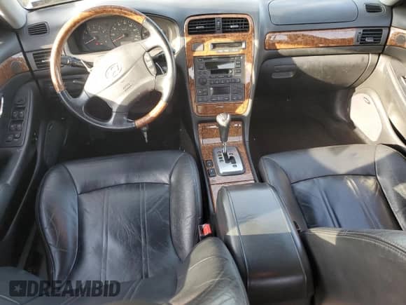 2005 Hyundai XG с VIN KMHFU45E25A426280, выставлен на аукционе Copart как лот 82589944 с пробегом 120 662 миль миль и Списание • Salvage title. История ставок и продаж доступна на DreamBid. Изображение 8.