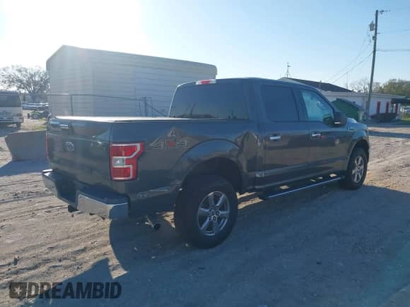 2018 Ford F-150 XL z VIN 1FTEW1EB7JKD00760, wystawiony jako IAAI lot #41641141 z przebiegiem 105 449 mil mil oraz . Historia ofert i sprzedaży dostępna na DreamBid. Obrazek 4.