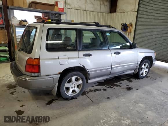 1999 Subaru Forester S with VIN JF1SF6552XG733673, listed as a Copart auction lot 55175035 with 207,847 mi miles and Clean title. Bid and sale history available at DreamBid. Image 3.