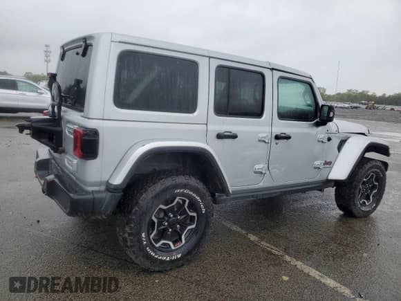 2023 Jeep Wrangler Rubicon z VIN 1C4JJXFM4PW589923, wystawiony jako Copart lot #58725465 z przebiegiem 9 814 mil mil oraz Szkoda całkowita • Salvage title. Historia ofert i sprzedaży dostępna na DreamBid. Obrazek 3.