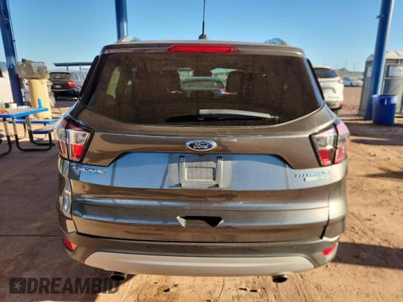 2017 Ford Escape Titanium with VIN 1FMCU9J9XHUC51563, listed as a Copart auction lot 81632235 with 52,259 mi miles and Salvage title. Bid and sale history available at DreamBid. Image 6.