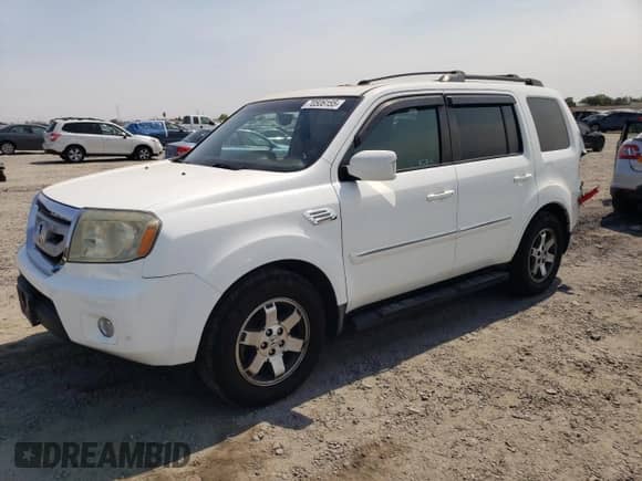 2010 Honda Pilot Touring with VIN 5FNYF4H86AB001871, listed as a Copart auction lot 70506155 with 133,582 mi miles and Salvage title. Bid and sale history available at DreamBid. Image 1.