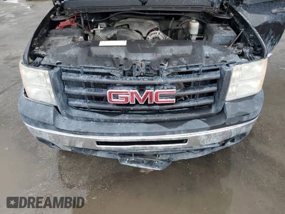 2011 GMC Sierra 1500 Work Truck z VIN 1GTN2TEA4BZ441924, wystawiony jako Copart lot #58874805 z przebiegiem 148 790 mil mil oraz Szkoda całkowita • Salvage title. Historia ofert i sprzedaży dostępna na DreamBid. Obrazek 11.