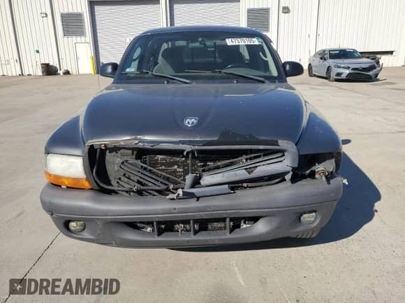 2003 Dodge Dakota с VIN 1D7HL12X53S358803, выставлен на аукционе Copart как лот 47570105 с пробегом 201 386 миль миль и Списание • Salvage title. История ставок и продаж доступна на DreamBid. Изображение 5.