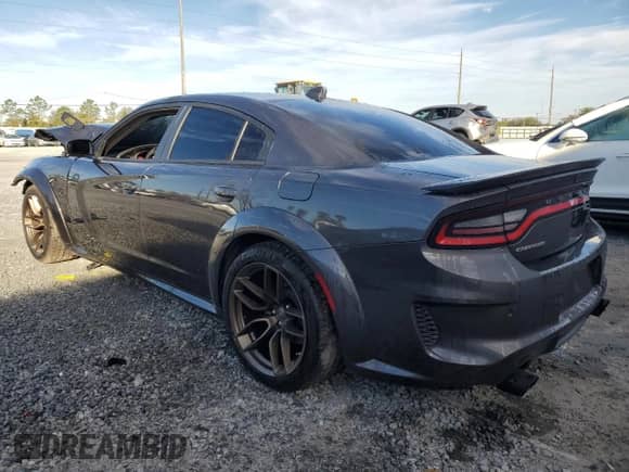 2023 Dodge Charger SRT Hellcat Redeye Widebody z VIN 2C3CDXL9XPH611488, wystawiony jako Copart lot #42526075 z przebiegiem 56 309 mil mil oraz Szkoda całkowita • Salvage title. Historia ofert i sprzedaży dostępna na DreamBid. Obrazek 2.
