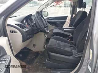 2014 Dodge Grand Caravan SE with VIN 2C4RDGBG7ER226869, listed as a IAAI auction lot 43312169 with 76,371 mi miles and . Bid and sale history available at DreamBid. Image 5.