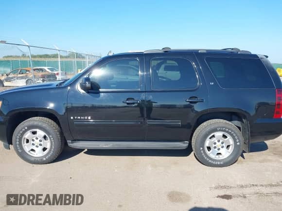 2009 Chevrolet Tahoe 2LT with VIN 1GNFK23079R260424, listed as a IAAI auction lot 43026277 with 253,109 mi miles and . Bid and sale history available at DreamBid. Image 14.