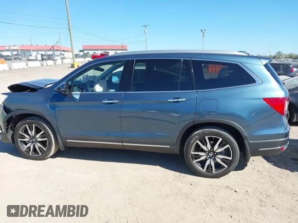 2019 Honda Pilot Touring 7-Passenger z VIN 5FNYF6H65KB087038, wystawiony jako IAAI lot #43396630 z przebiegiem 98 756 mil mil oraz . Historia ofert i sprzedaży dostępna na DreamBid. Obrazek 14.