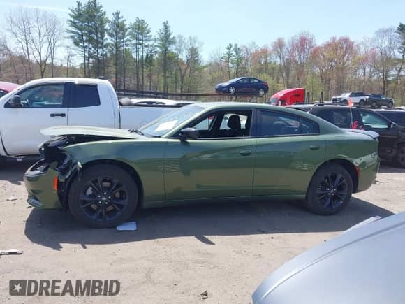 2023 Dodge Charger SXT with VIN 2C3CDXJGXPH675970, listed as a IAAI auction lot 42074717 with 5,930 mi miles and . Bid and sale history available at DreamBid. Image 14.