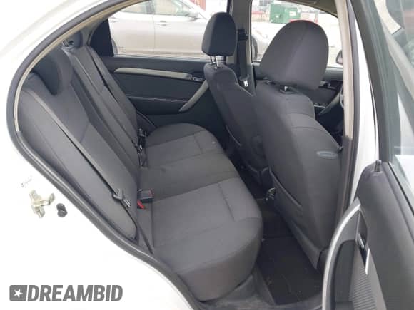 2011 Chevrolet Aveo 1LT with VIN KL1TD5DE6BB255979, listed as a IAAI auction lot 42771013 with 128,636 mi miles and . Bid and sale history available at DreamBid. Image 8.