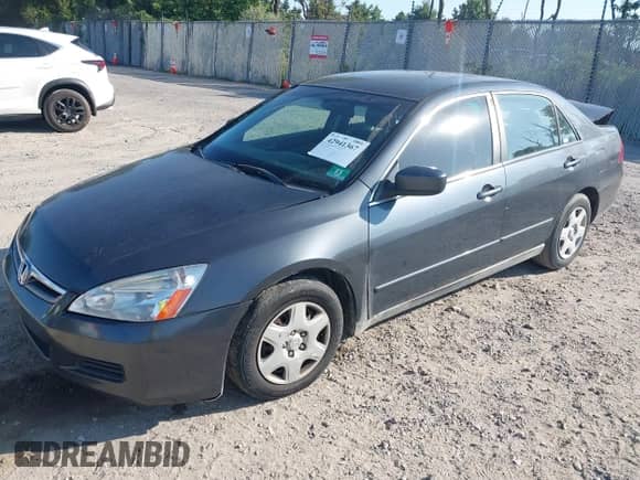 2006 Honda Accord LX z VIN 1HGCM564X6A019510, wystawiony jako IAAI lot #42941367 z przebiegiem 184 950 mil mil oraz . Historia ofert i sprzedaży dostępna na DreamBid. Obrazek 17.