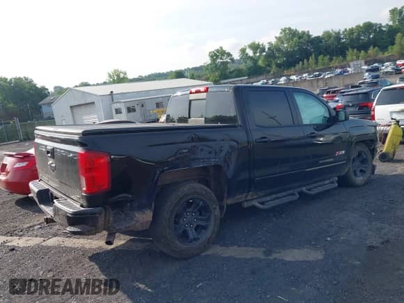 2017 Chevrolet Silverado 1500 LTZ z VIN 3GCUKSEJ0HG321648, wystawiony jako IAAI lot #42701782 z przebiegiem 143 515 mil mil oraz . Historia ofert i sprzedaży dostępna na DreamBid. Obrazek 4.