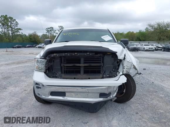 2018 Ram 1500 SLT with VIN 1C6RR6GG7JS303941, listed as a IAAI auction lot 41942236 with 142,098 mi miles and . Bid and sale history available at DreamBid. Image 13.