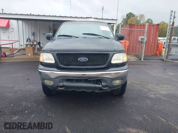 1999 Ford F-150 with VIN 1FTRX18W3XNC34874, listed as a IAAI auction lot 43532383 with 2,757,620 mi miles and . Bid and sale history available at DreamBid. Image 6.