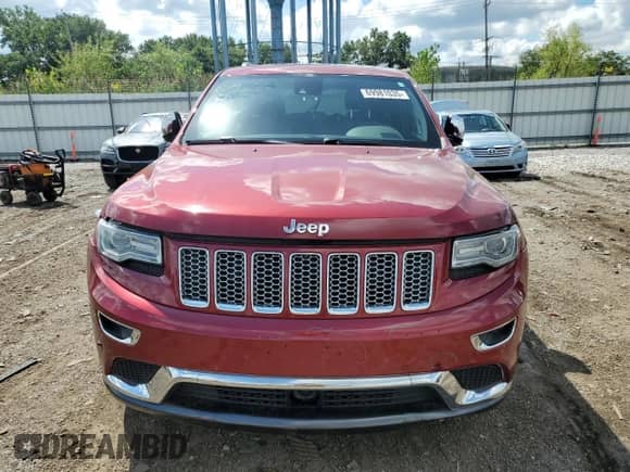 2014 Jeep Grand Cherokee Summit with VIN 1C4RJFJT8EC308989, listed as a Copart auction lot 69981035 with 105,401 mi miles and Salvage title. Bid and sale history available at DreamBid. Image 5.