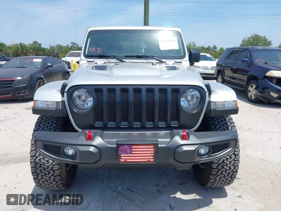 2023 Jeep Wrangler Rubicon with VIN 1C4JJXFG0PW522651, listed as a IAAI auction lot 42112210 with 7,744 mi miles and . Bid and sale history available at DreamBid. Image 13.
