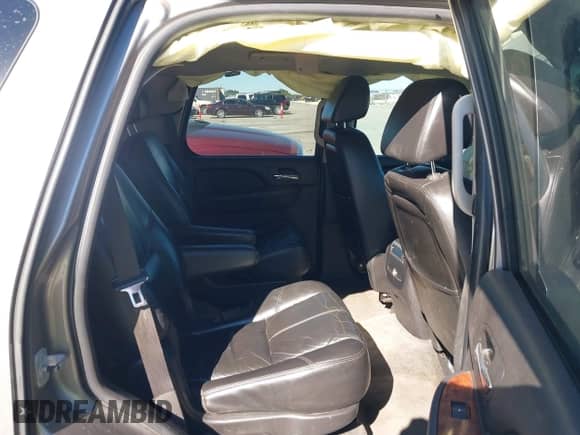 2007 Chevrolet Tahoe LTZ with VIN 1GNFC13J97R155705, listed as a IAAI auction lot 40914171 with 165,727 mi miles and . Bid and sale history available at DreamBid. Image 8.