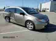 2011 Honda Odyssey Touring с VIN 5FNRL5H92BB030023, выставлен на аукционе Copart как лот 87486035 с пробегом 160 309 миль миль и Списание • Salvage title. История ставок и продаж доступна на DreamBid. Изображение 14.