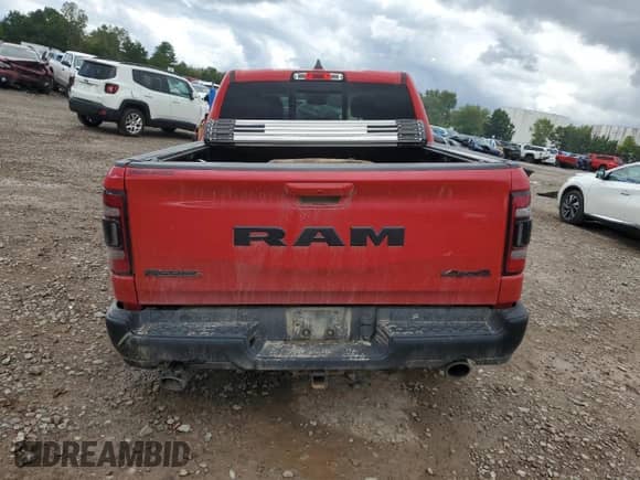 2020 Ram 1500 Rebel z VIN 1C6SRFLT5LN142849, wystawiony jako Copart lot #70570685 z przebiegiem 63 406 mil mil oraz Szkoda całkowita • Salvage title. Historia ofert i sprzedaży dostępna na DreamBid. Obrazek 6.