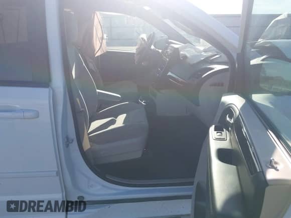 2016 Dodge Grand Caravan SE with VIN 2C7WDGBG8GR364364, listed as a IAAI auction lot 43031975 with 63,881 mi miles and . Bid and sale history available at DreamBid. Image 5.