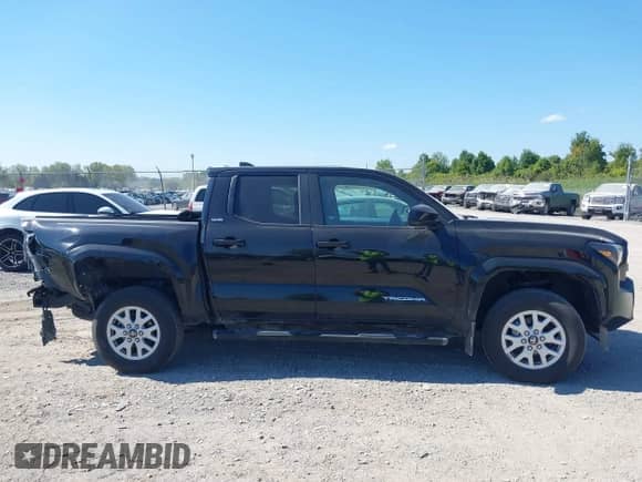 2024 Toyota Tacoma SR5 with VIN 3TMLB5JN4RM068147, listed as a IAAI auction lot 43177753 with 15,469 mi miles and . Bid and sale history available at DreamBid. Image 13.