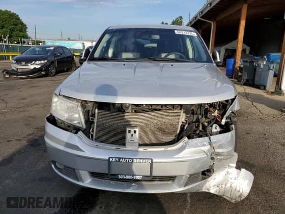 2009 Dodge Journey SXT with VIN 3D4GH57V09T508350, listed as a Copart auction lot 66213735 with 149,765 mi miles and Salvage title. Bid and sale history available at DreamBid. Image 5.