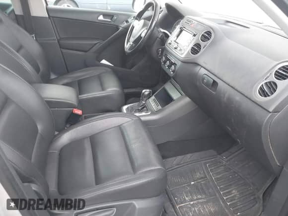 2011 Volkswagen Tiguan S with VIN WVGBV7AXXBW560022, listed as a IAAI auction lot 42693212 with 127,879 mi miles and . Bid and sale history available at DreamBid. Image 5.