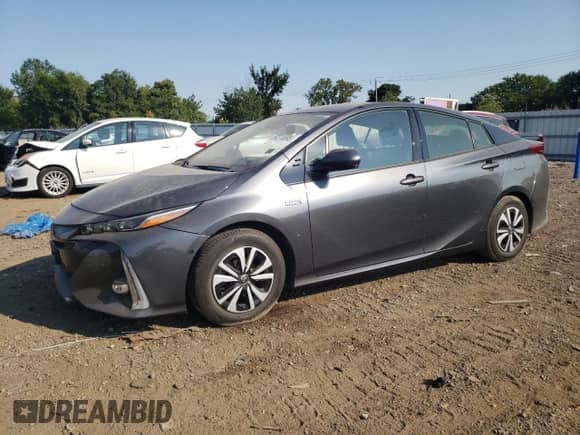 2018 Toyota Prius Plus with VIN JTDKARFP1J3100462, listed as a Copart auction lot 80514995 with 70,669 mi miles and Salvage title. Bid and sale history available at DreamBid. Image 1.