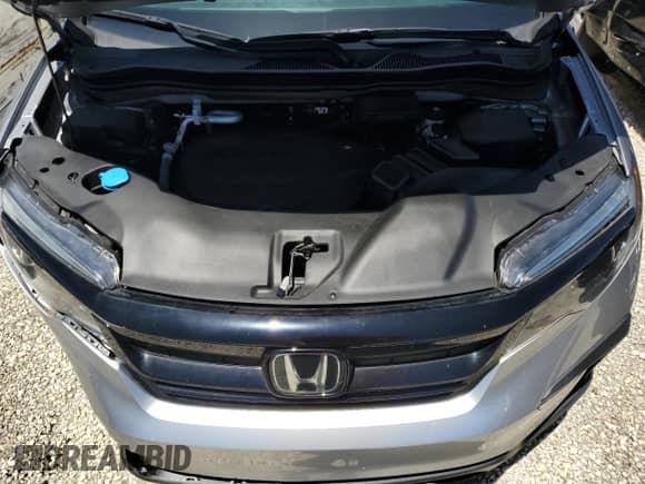 2022 Honda Pilot Special Edition z VIN 5FNYF5H22NB033627, wystawiony jako Copart lot #68681855 z przebiegiem 32 792 mil mil oraz Szkoda całkowita • Salvage title. Historia ofert i sprzedaży dostępna na DreamBid. Obrazek 12.