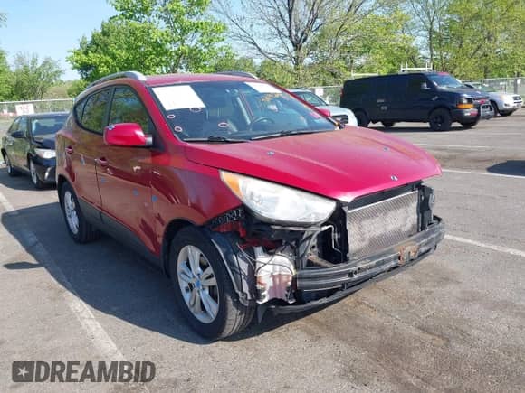 2011 Hyundai Tucson Limited with VIN KM8JUCAC4BU143656, listed as a IAAI auction lot 42144244 with 128,470 mi miles and . Bid and sale history available at DreamBid. Image 1.