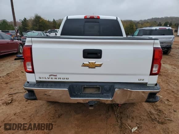 2017 Chevrolet Silverado 1500 LTZ with VIN 3GCUKSECXHG323750, listed as a Copart auction lot 90643185 with 321,487 mi miles and Clean title. Bid and sale history available at DreamBid. Image 6.