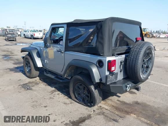 2015 Jeep Wrangler Sport with VIN 1C4AJWAG0FL773008, listed as a IAAI auction lot 42422112 with 88,370 mi miles and . Bid and sale history available at DreamBid. Image 3.