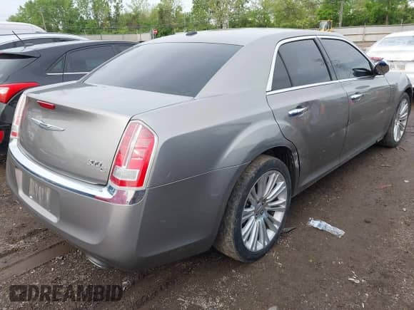 2014 Chrysler 300 C with VIN 2C3CCAET9EH141833, listed as a IAAI auction lot 42198625 with 150,814 mi miles and . Bid and sale history available at DreamBid. Image 4.