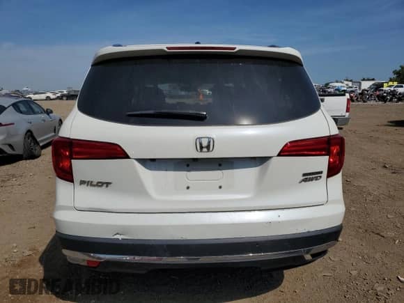 2017 Honda Pilot Touring с VIN 5FNYF6H94HB004704, выставлен на аукционе Copart как лот 80646605 с пробегом 173 476 миль миль и Списание • Salvage title. История ставок и продаж доступна на DreamBid. Изображение 6.