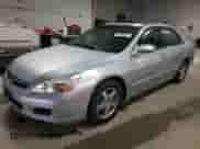 2006 Honda Accord with NAVI z VIN JHMCN36576C003471, wystawiony jako Copart lot #59330565 z przebiegiem 92 999 mil mil oraz Szkoda całkowita • Salvage title. Historia ofert i sprzedaży dostępna na DreamBid. Obrazek 1.