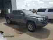 2019 Toyota Tacoma TRD Sport with VIN 5TFAZ5CN4KX078788, listed as a Copart auction lot 59543625 with 66,302 mi miles and Salvage title. Bid and sale history available at DreamBid. Image 4.