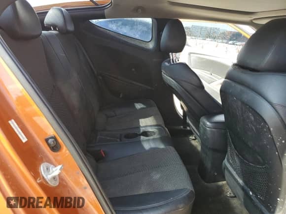 2013 Hyundai Veloster w/Black Int с VIN KMHTC6AD9DU094754, выставлен на аукционе Copart как лот 64644975 с пробегом 165 871 миль миль и Списание • Salvage title. История ставок и продаж доступна на DreamBid. Изображение 10.