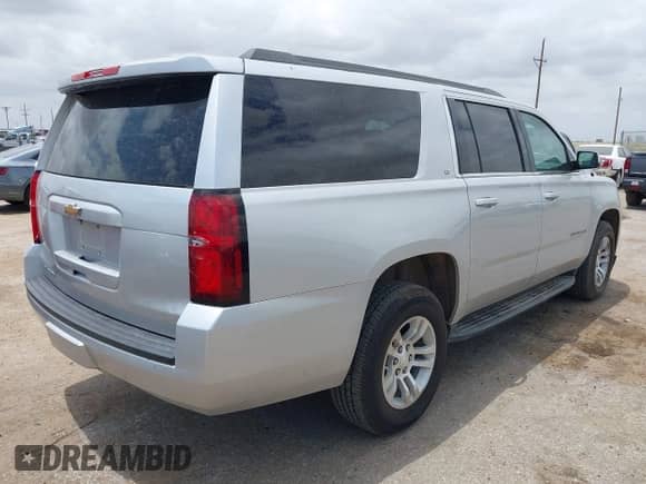 2019 Chevrolet Suburban LT z VIN 1GNSCHKC0KR380047, wystawiony jako IAAI lot #42530451 z przebiegiem 94 361 mil mil oraz . Historia ofert i sprzedaży dostępna na DreamBid. Obrazek 4.