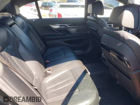 2019 BMW 7 Series 740i xDrive with VIN WBA7E4C57KGV70521, listed as a IAAI auction lot 41881538 with 114,480 mi miles and . Bid and sale history available at DreamBid. Image 8.