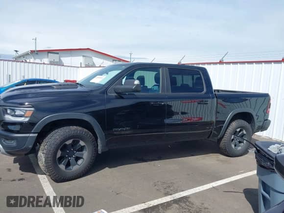 2019 Ram 1500 Rebel с VIN 1C6SRFLT2KN592652, выставлен на аукционе IAAI как лот 41989054 с пробегом 71 630 миль миль и . История ставок и продаж доступна на DreamBid. Изображение 14.