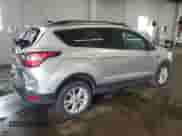 2017 Ford Escape SE z VIN 1FMCU9G91HUE87820, wystawiony jako Copart lot #80785325 z przebiegiem 118 426 mil mil oraz Szkoda całkowita • Salvage title. Historia ofert i sprzedaży dostępna na DreamBid. Obrazek 3.