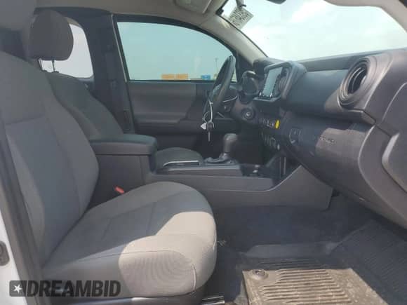 2020 Toyota Tacoma SR с VIN 5TFSX5EN1LX071757, выставлен на аукционе Copart как лот 59334675 с пробегом 63 971 миль миль и Списание • Salvage title. История ставок и продаж доступна на DreamBid. Изображение 7.